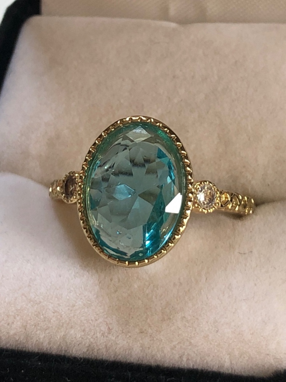 Gold blue stone ring